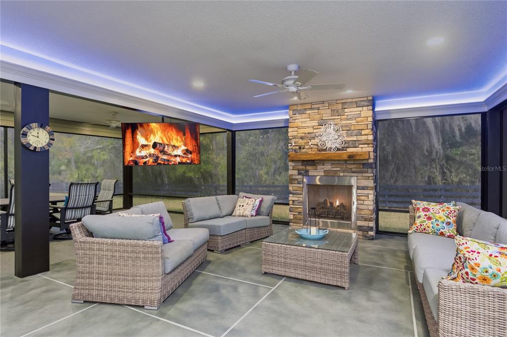 4788 Rostas Way The Villages, FL 32163 - Photo 15 of 40 a living room with furniture and a flat screen tv