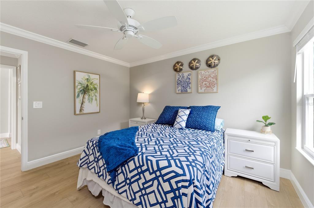 4788 Rostas Way The Villages, FL 32163 - Photo 23 of 40 a bedroom with a large bed and a window
