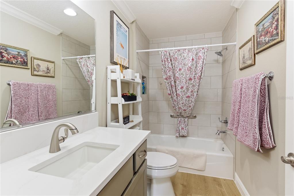 4788 Rostas Way The Villages, FL 32163 - Photo 25 of 40 a bathroom with a sink toilet and shower