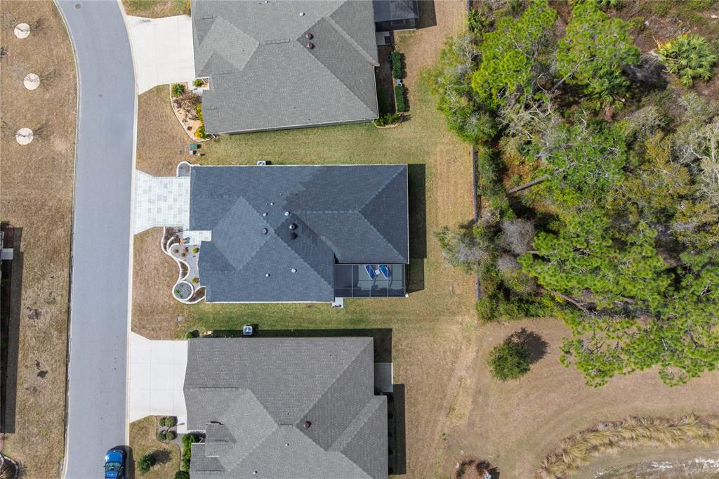 4788 Rostas Way The Villages, FL 32163 - Photo 33 of 40 an aerial view of a house with a yard