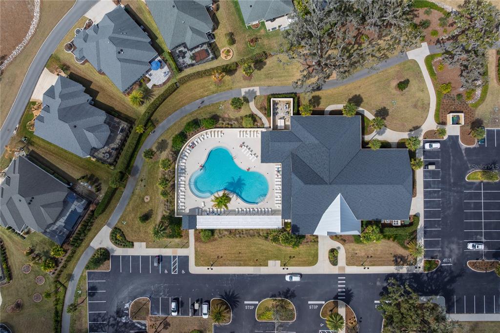 4788 Rostas Way The Villages, FL 32163 - Photo 34 of 40 an aerial view of a house with a swimming pool