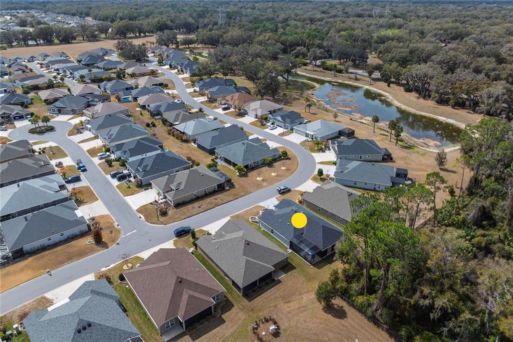 4788 Rostas Way The Villages, FL 32163 - Photo 36 of 40 an aerial view of a city with lots of residential buildings