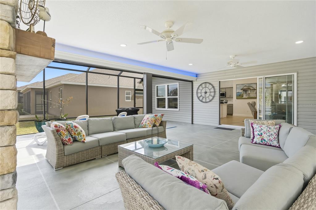 4788 Rostas Way The Villages, FL 32163 - Photo 7 of 40 a living room with furniture and a large window