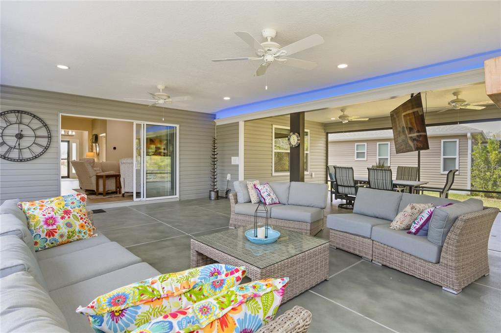 4788 Rostas Way The Villages, FL 32163 - Photo 8 of 40 a living room with furniture and dining area