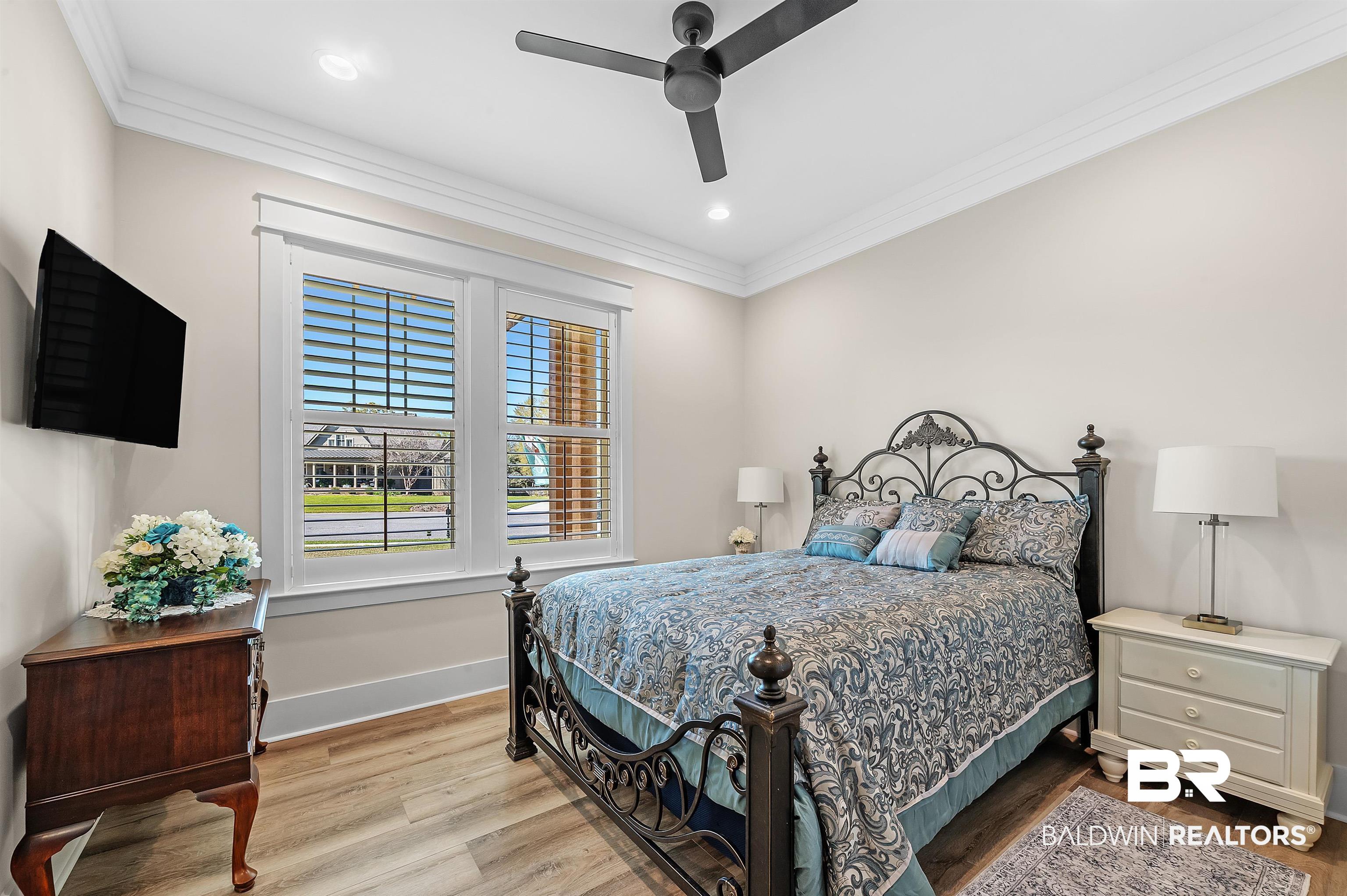 9144 Harvest Ridge Fairhope, AL 36532 - Photo 35 of 58 Bedroom featuring recessed lighting, ornamental molding, baseboards, ceiling fan, and wood finished floors