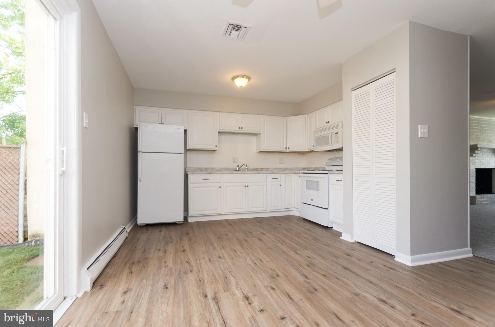 804 Walnut Ridge Drive Pottstown, PA 19464 - Photo 5 of 19 New beautiful flooring in kitchen and dining room