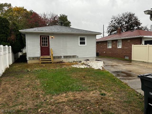 586 Ingalls Road Akron, OH 44312 - Photo 4 of 21 Rear view of house featuring entry steps