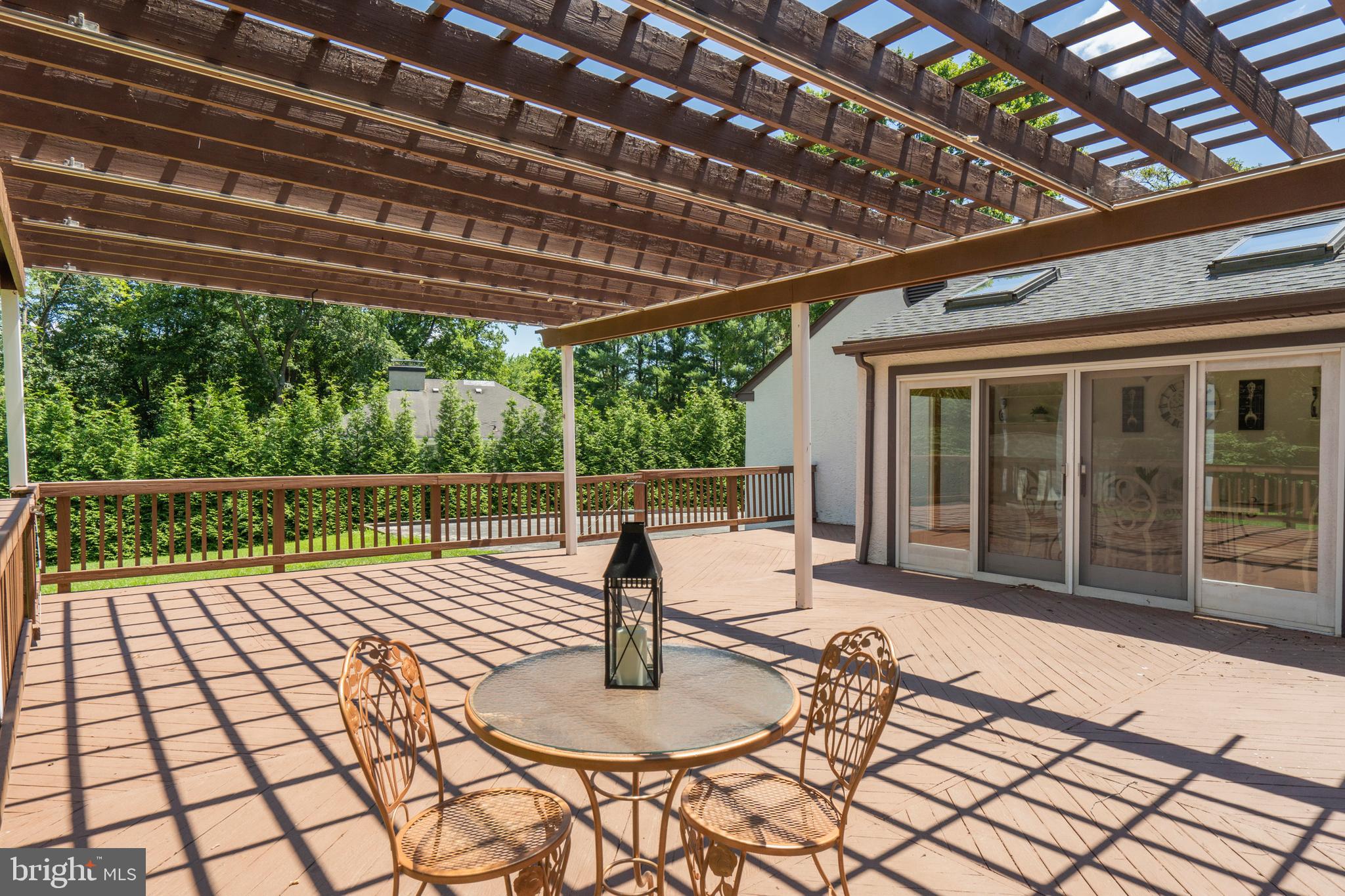 841 Hunt Road Newtown Square, PA 19073 - Photo 40 of 56 Deck and pergola off of kitchen and FR