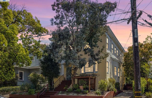 a view of a street with houses