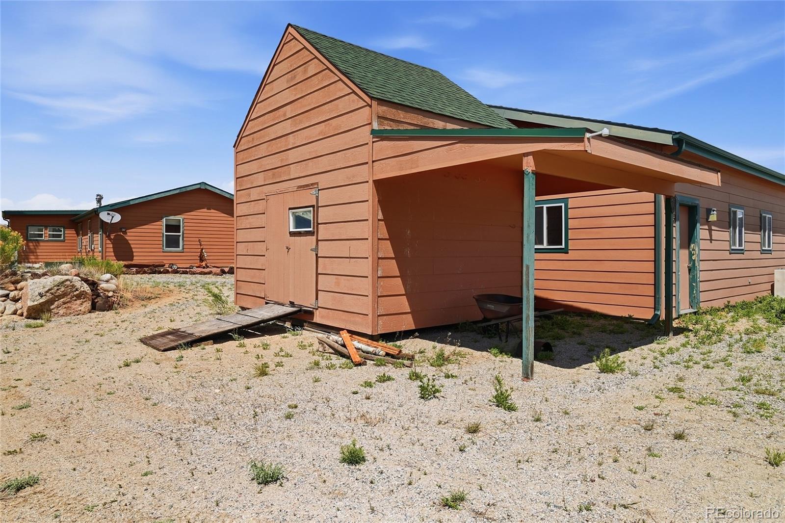 20300 Old Ranch Loop Nathrop, CO 81236 - Photo 30 of 35 a view of a house with wooden fence