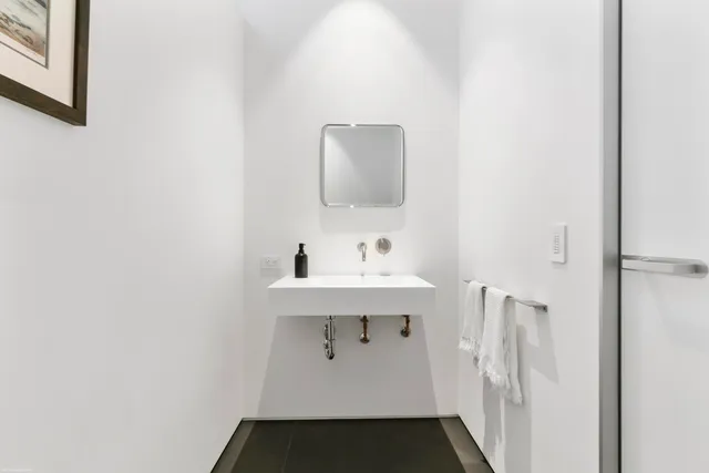 a view of a living room and workspace