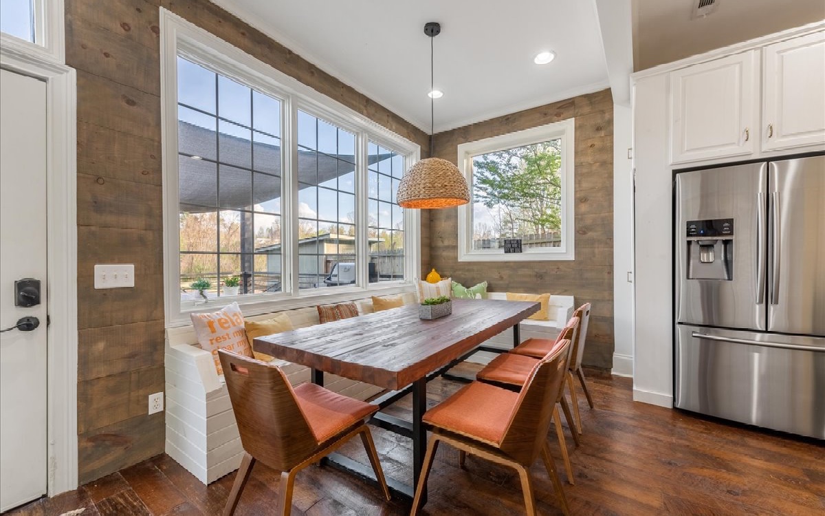 222 Ada Street Blue Ridge, GA 30513 - Photo 26 of 74 a view of a dining room with furniture window and wooden floor