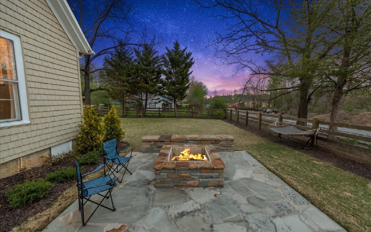 222 Ada Street Blue Ridge, GA 30513 - Photo 32 of 74 a view of a backyard with sitting area