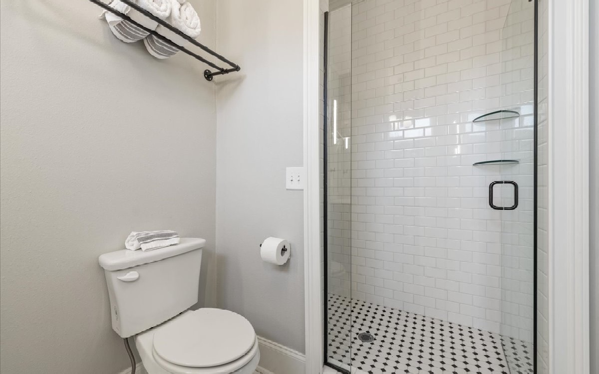 222 Ada Street Blue Ridge, GA 30513 - Photo 57 of 74 a white toilet sitting next to a shower