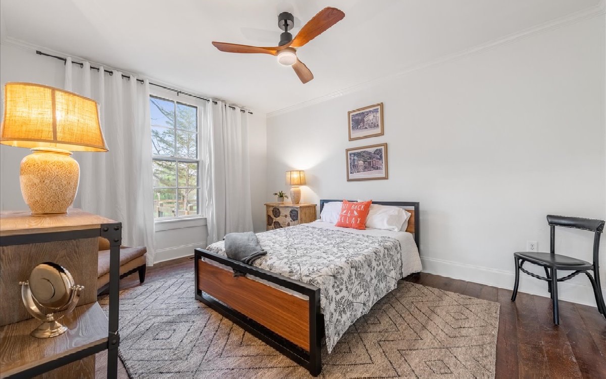 222 Ada Street Blue Ridge, GA 30513 - Photo 58 of 74 a bedroom with a bed and a window