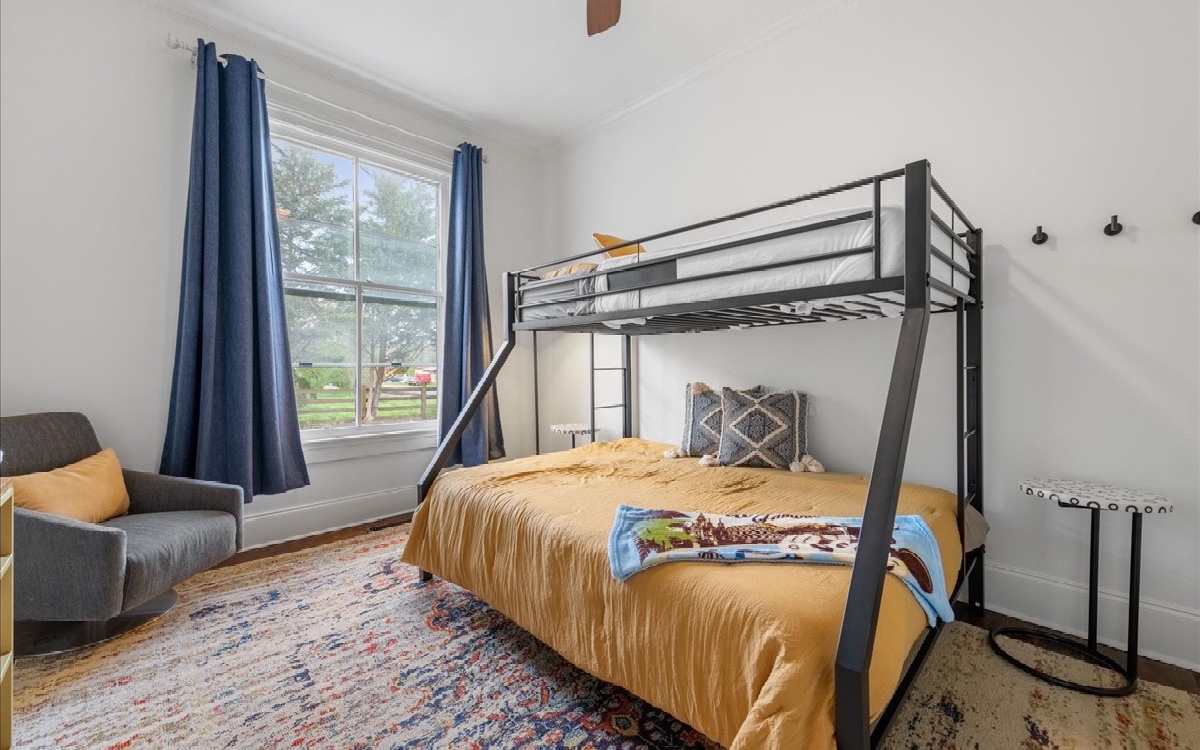 222 Ada Street Blue Ridge, GA 30513 - Photo 63 of 74 a bedroom with a bed and a window