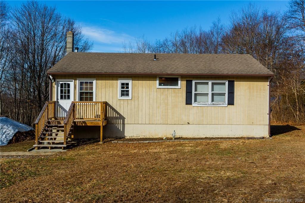 287 Hell Hollow Road Voluntown, CT 06384 - Photo 1 of 1 a house with trees in the background