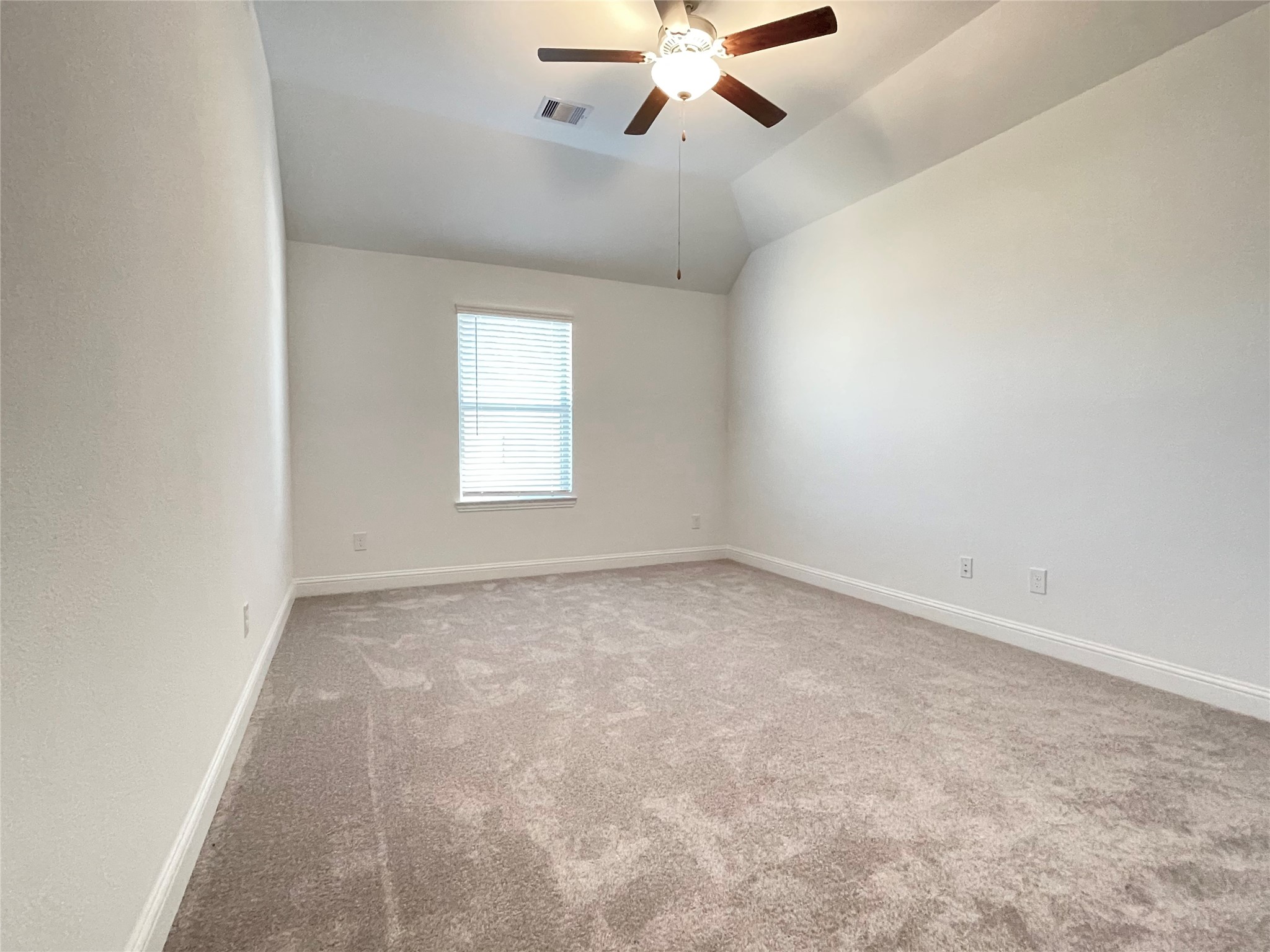 29806 Cherry Vine Road Katy, TX 77494 - Photo 22 of 30 an empty room with windows and fan