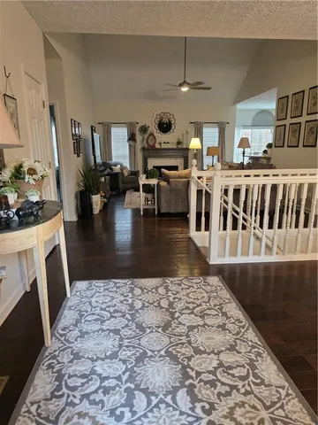 a view of a living room and dining room