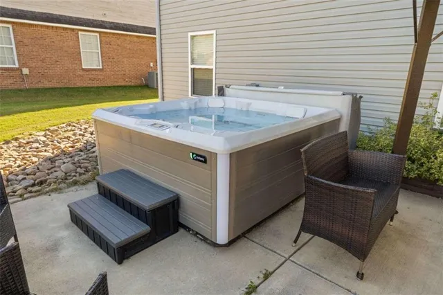 a view of a house with swimming pool