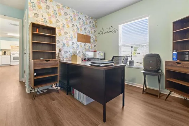 a room with a desk and chair