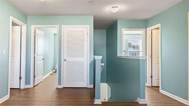 a view of entryway with wooden floor