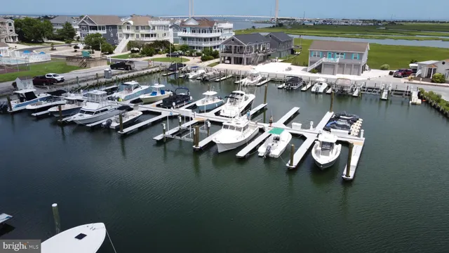 a view of a lake with boats and trees
