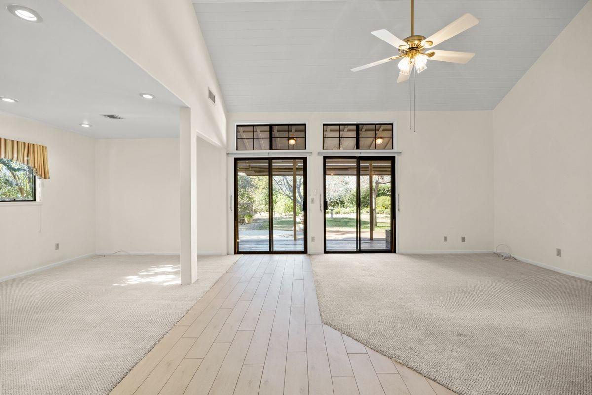 435 Gridley Road Ojai, CA 93023 - Photo 5 of 20 an empty room with windows and ceiling fan