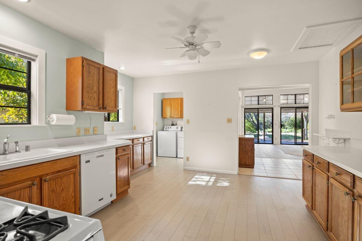 435 Gridley Road Ojai, CA 93023 - Photo 9 of 20 a large white kitchen with a large window