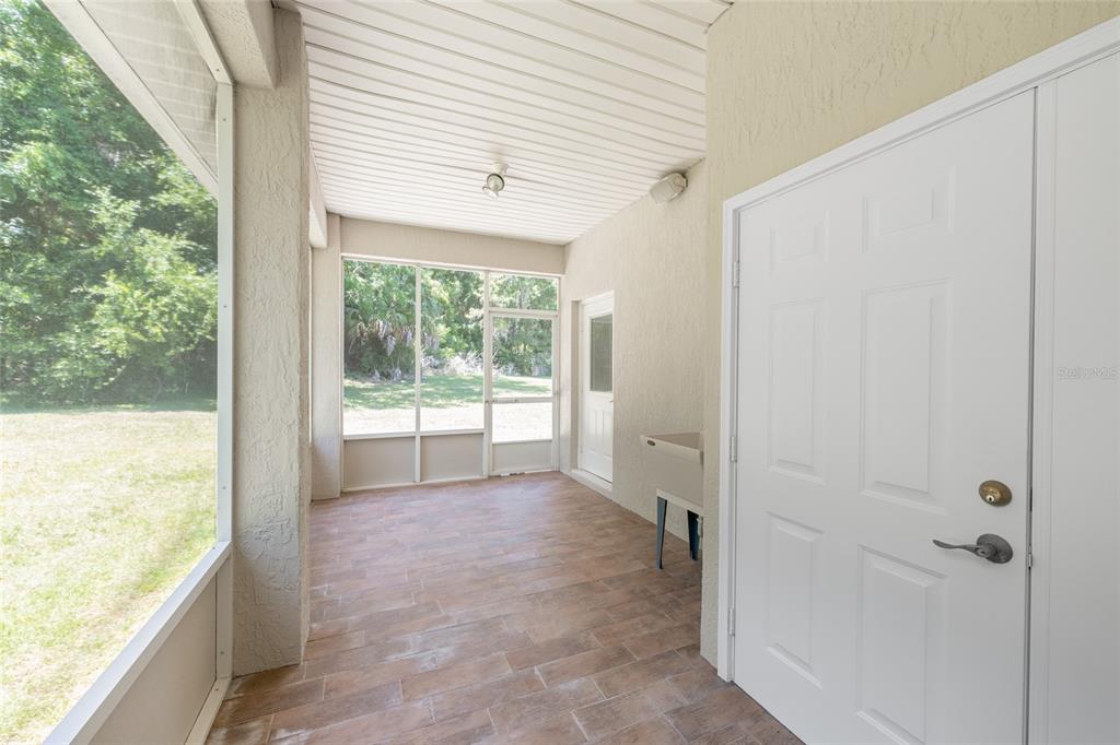 4735 Southeast 112th Street Road Belleview, FL 34420 - Photo 40 of 73 a view of a large window with an outdoor space