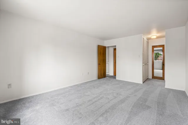 an empty room with an entryway