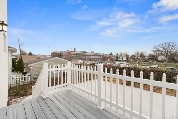 a view of a balcony with city view