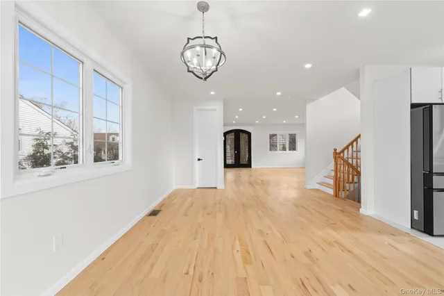 a view of a kitchen with a dishwasher and cabinets