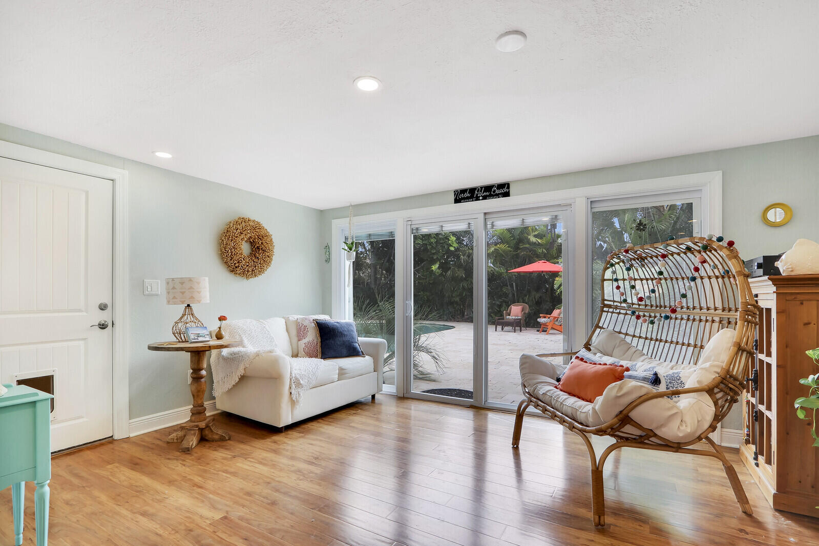 444 Inlet Road North Palm Beach, FL 33408 - Photo 19 of 40 Family Room Leading to Pool