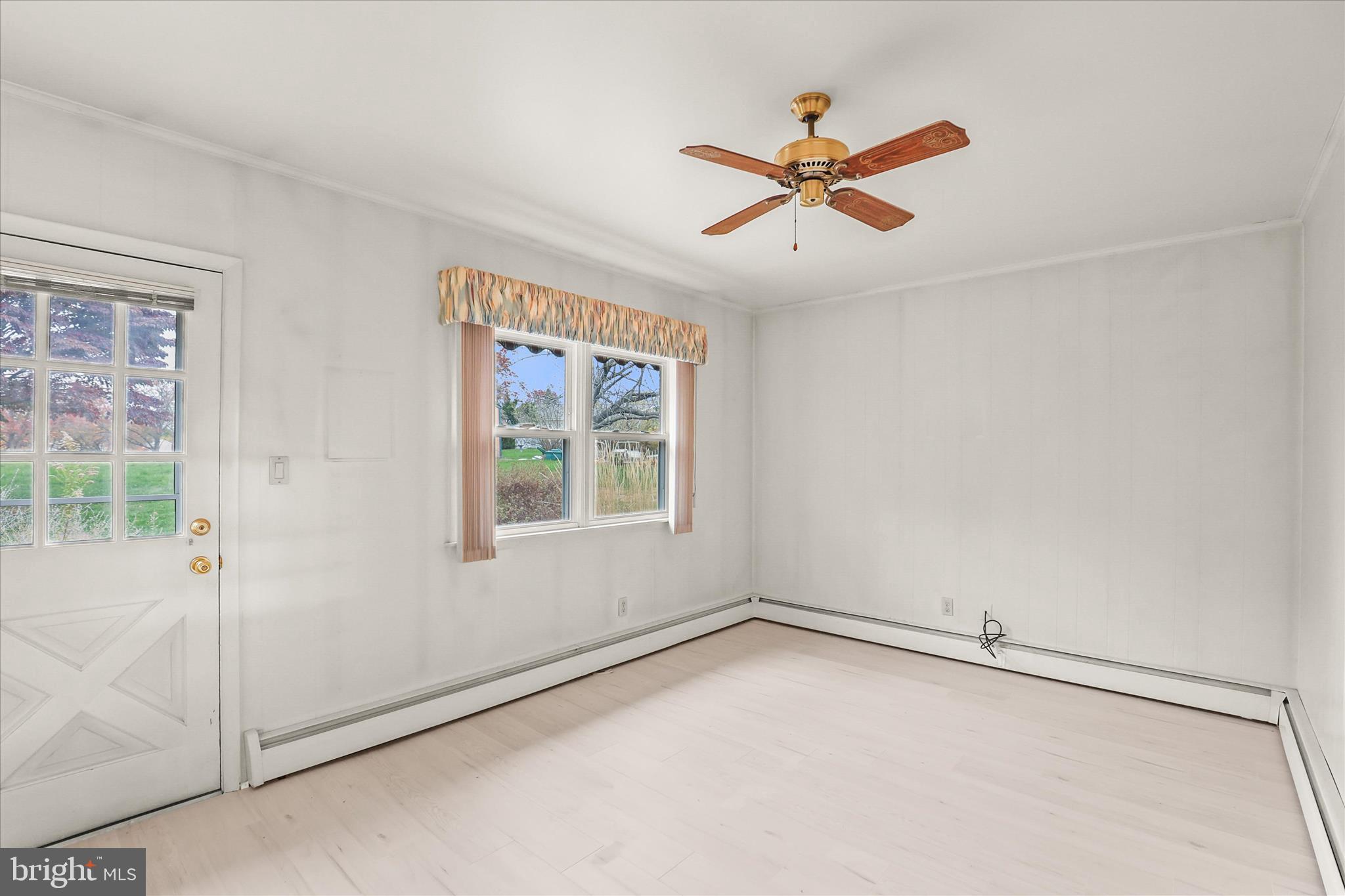 531 Rupley Road Camp Hill, PA 17011 - Photo 15 of 36 a view of a livingroom with a ceiling fan and window