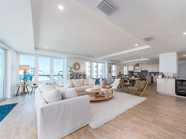 a bedroom with a bed and a large mirror