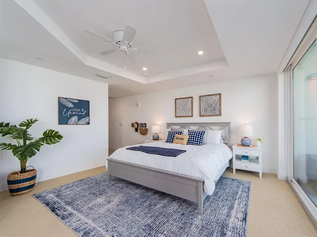 an aerial view of a city with ocean view