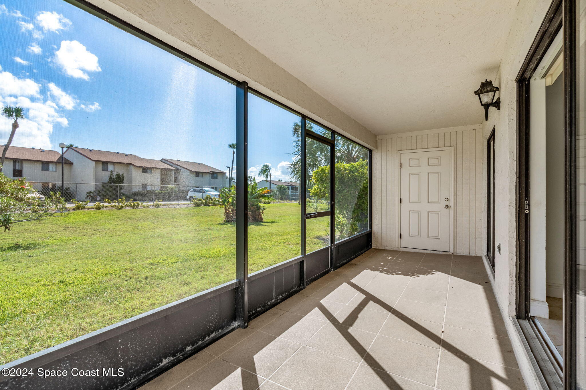 5807 North Atlantic Avenue, Unit 411 Cape Canaveral, FL 32920 - Photo 16 of 31 a view of an ocean from a balcony