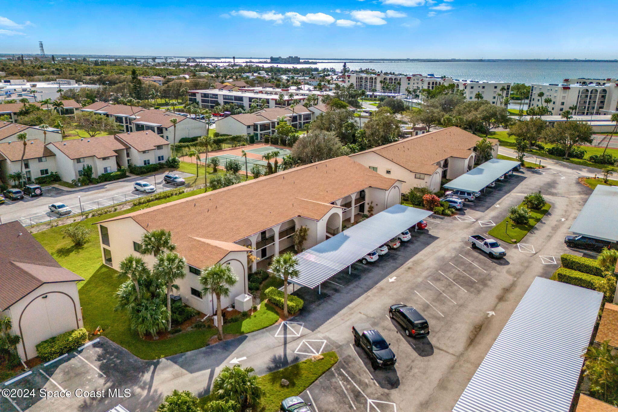 5807 North Atlantic Avenue, Unit 411 Cape Canaveral, FL 32920 - Photo 21 of 31 an aerial view of a city