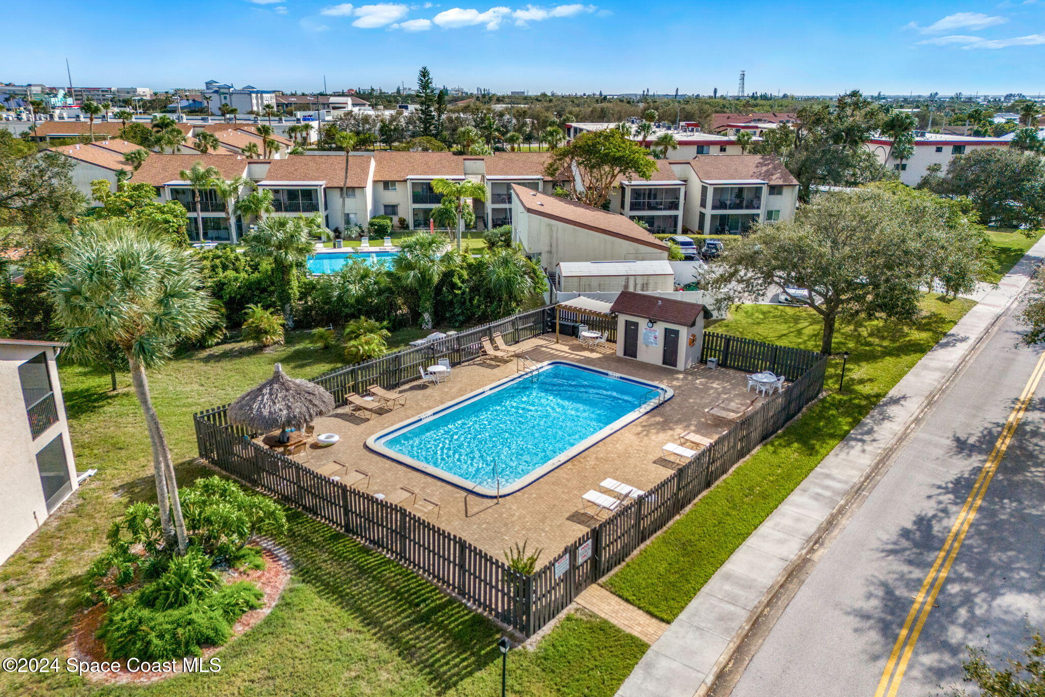 5807 North Atlantic Avenue, Unit 411 Cape Canaveral, FL 32920 - Photo 26 of 31 an aerial view of a house having outdoor space