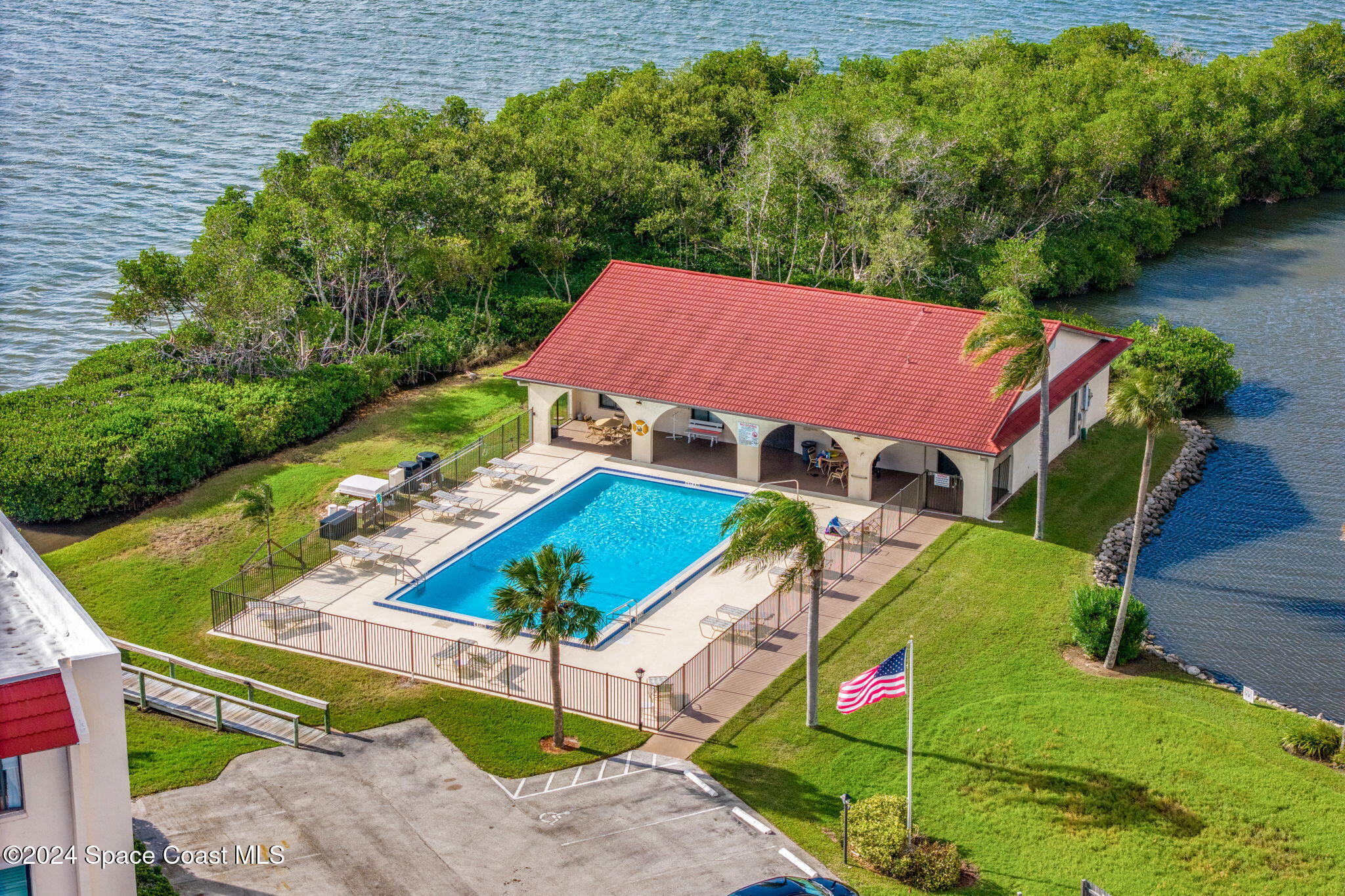 5807 North Atlantic Avenue, Unit 411 Cape Canaveral, FL 32920 - Photo 28 of 31 an aerial view of a house
