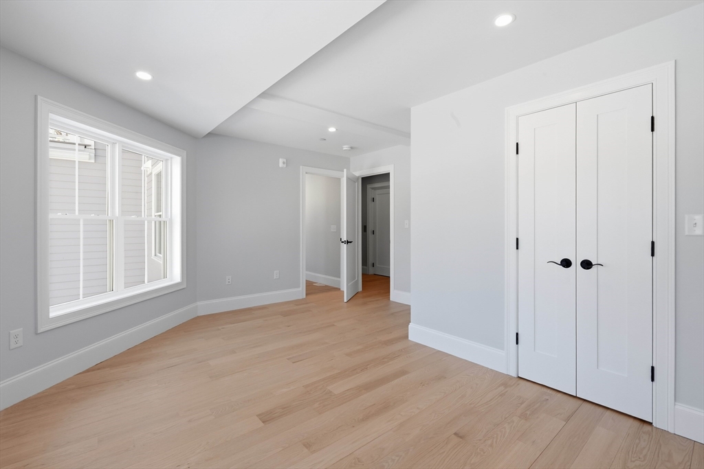 51 West Main Street, Unit 6R Georgetown, MA 01833 - Photo 20 of 40 a view of an empty room with a window
