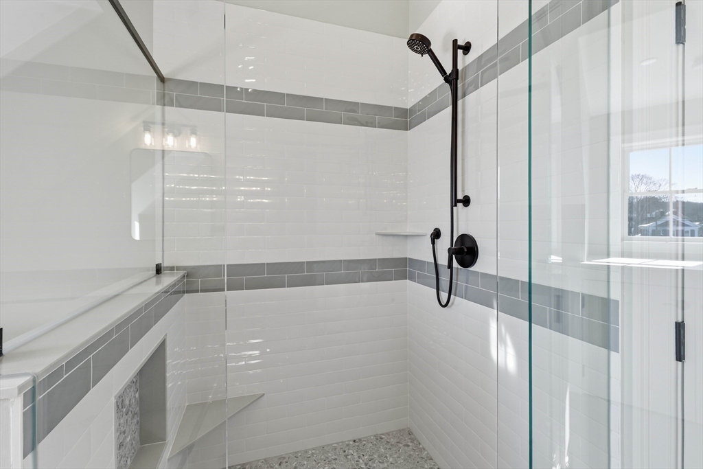 51 West Main Street, Unit 6R Georgetown, MA 01833 - Photo 36 of 40 a bathroom with a bathtub and a shower