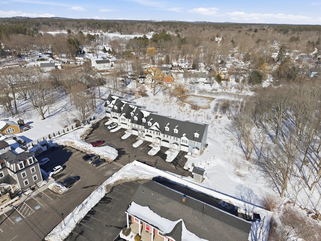51 West Main Street, Unit 6R Georgetown, MA 01833 - Photo 6 of 40 an aerial view of multiple house