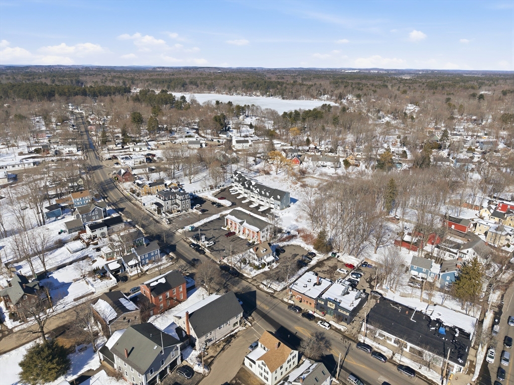 51 West Main Street, Unit 6R Georgetown, MA 01833 - Photo 8 of 40 an aerial view of a city with lots of residential buildings