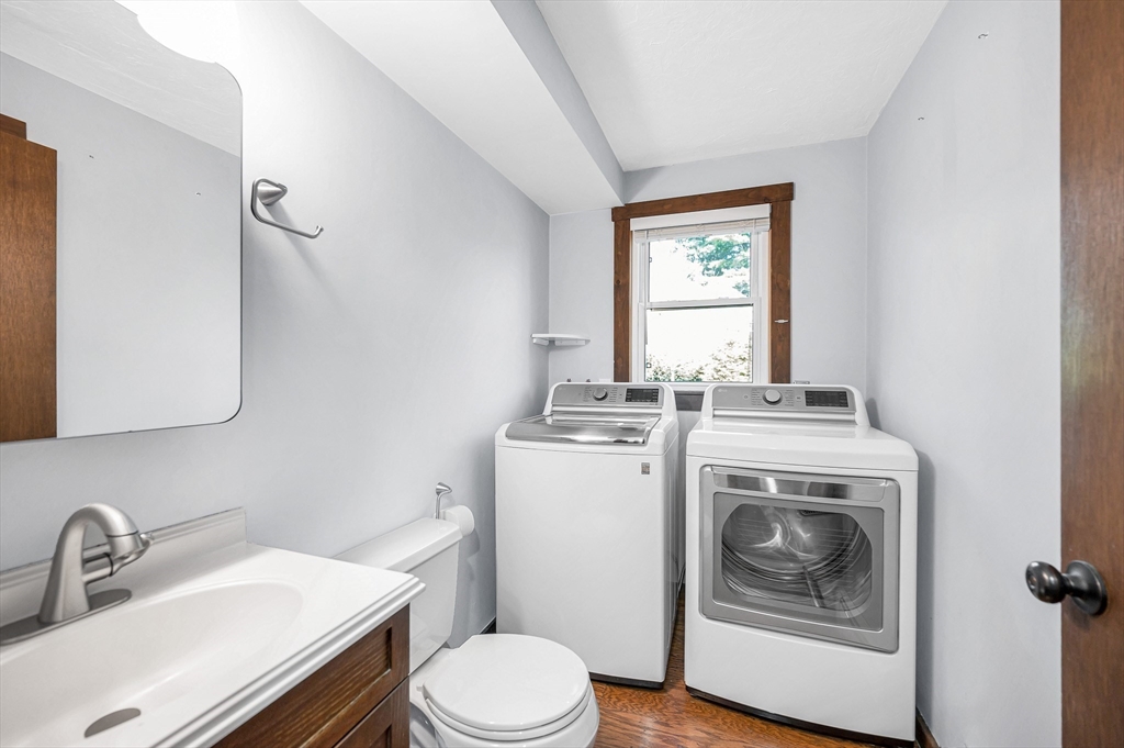 163 Water Street Framingham, MA 01701 - Photo 13 of 37 a bathroom with a sink toilet and window