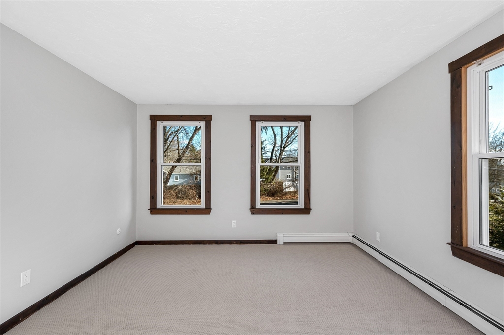 163 Water Street Framingham, MA 01701 - Photo 20 of 37 an empty room with windows