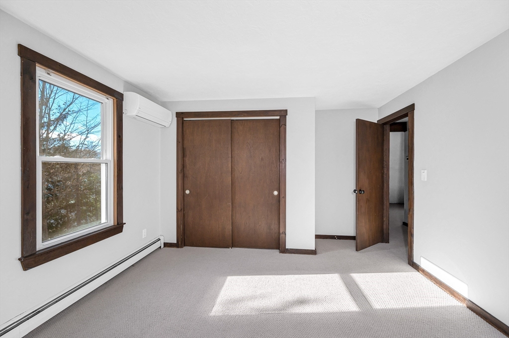 163 Water Street Framingham, MA 01701 - Photo 21 of 37 a view of an empty room and window