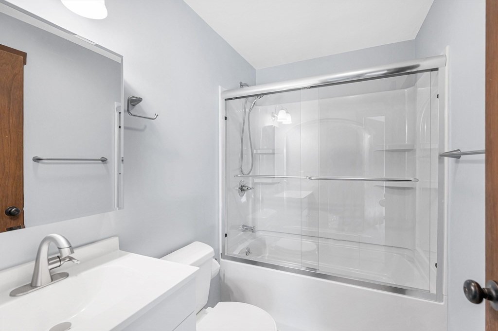 163 Water Street Framingham, MA 01701 - Photo 22 of 37 a bathroom with a shower and toilet