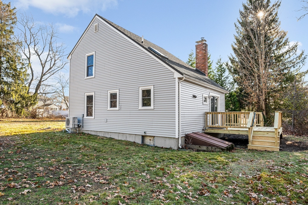 163 Water Street Framingham, MA 01701 - Photo 31 of 37 a view of a house with a yard